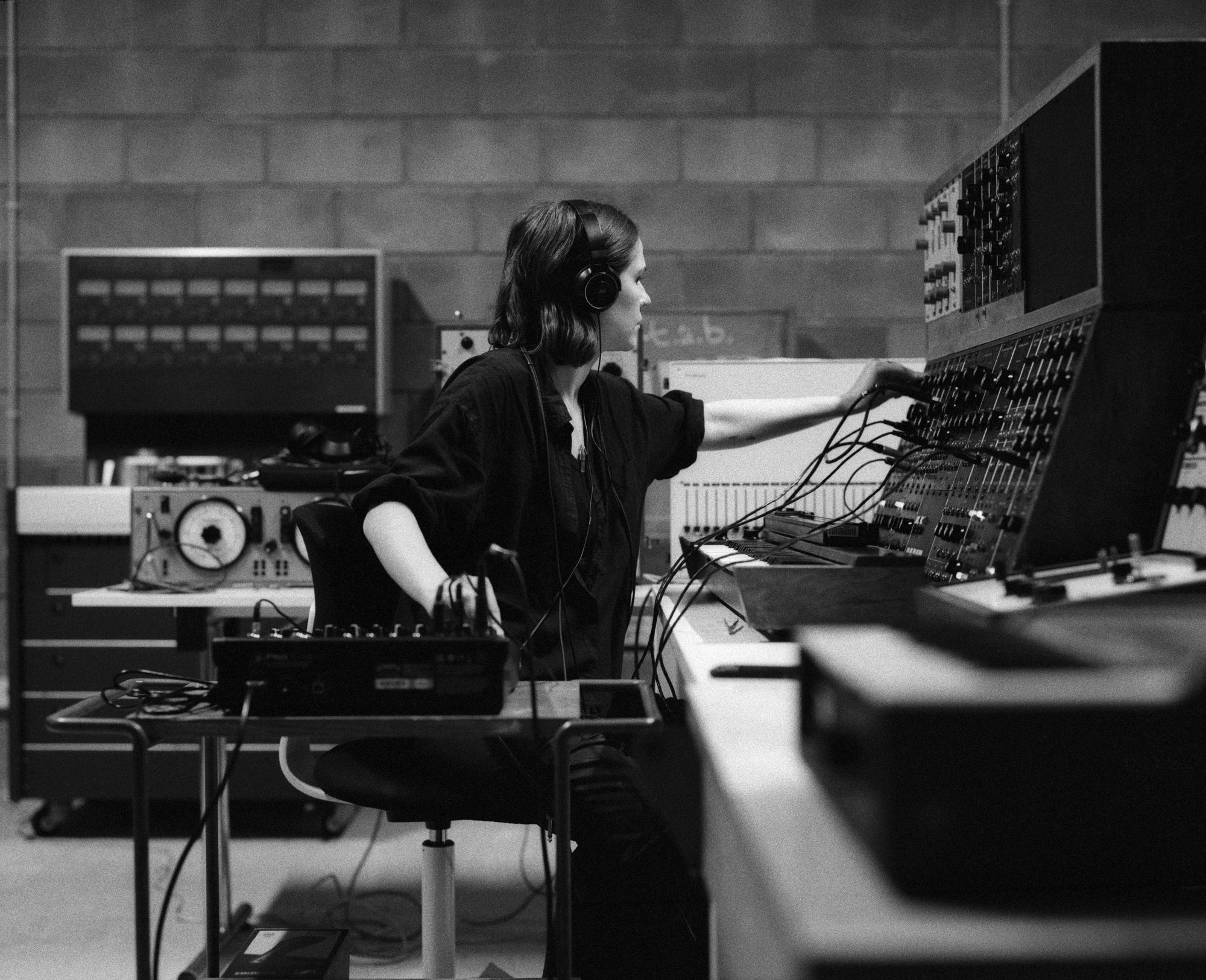 Artist Aleksandra Słyż working with the instruments from the Polish Radio Experimental Studio (SEPR), Museum of Modern Art Warsaw, May 2025. Image by Thomas Zanon-Larcher